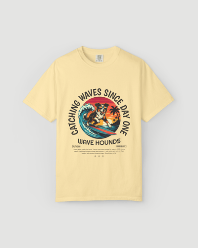 Wave Hounds Surf Tee – Banana featuring retro surf graphic on a lightweight yellow tee.
