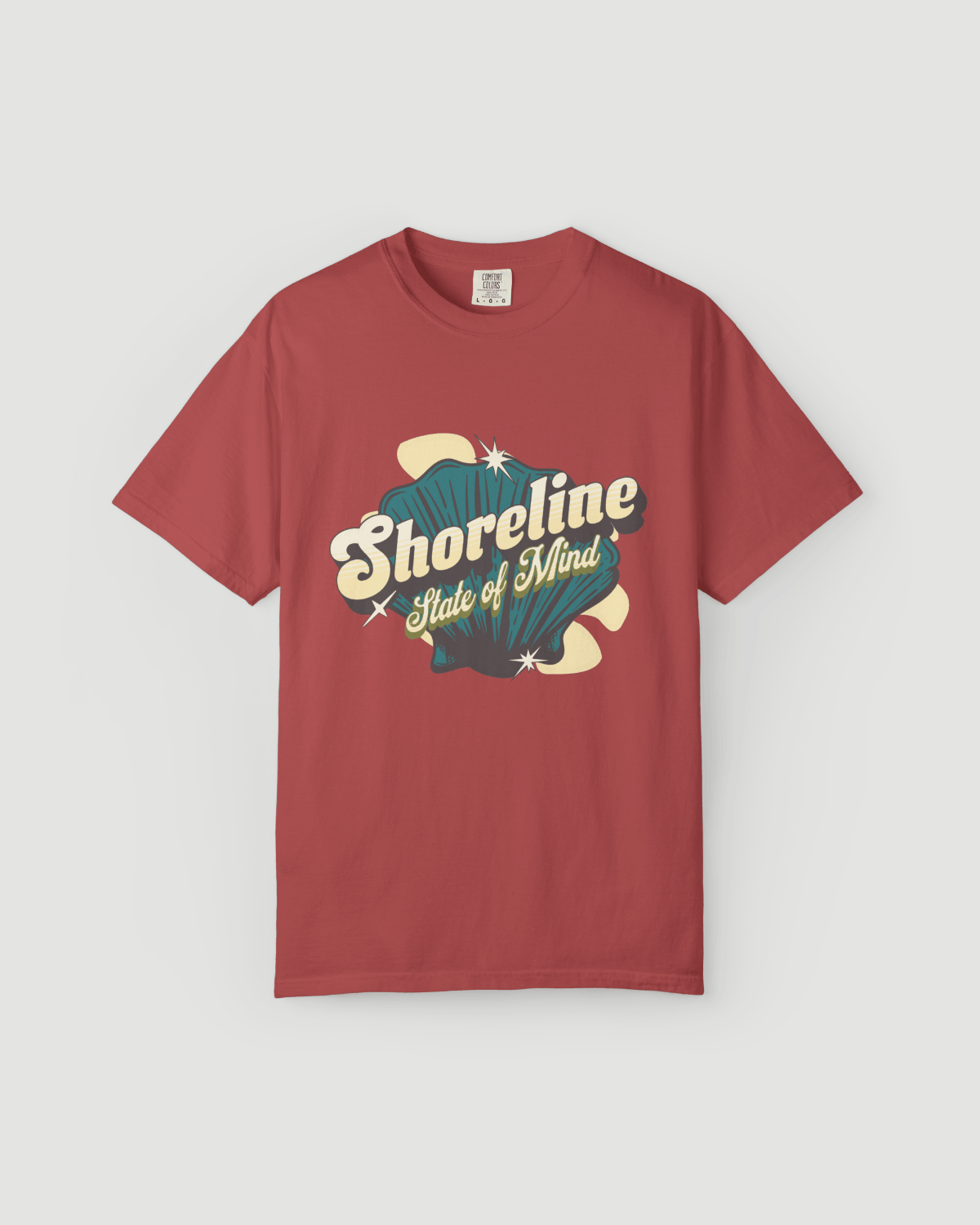 Shoreline State of Mind Tee – Crimson featuring a vintage seashell graphic on a crimson shirt.