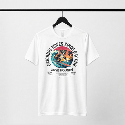 Wave Hounds Surf Tee – White featuring retro surf graphic, perfect for beach days and summer fun.