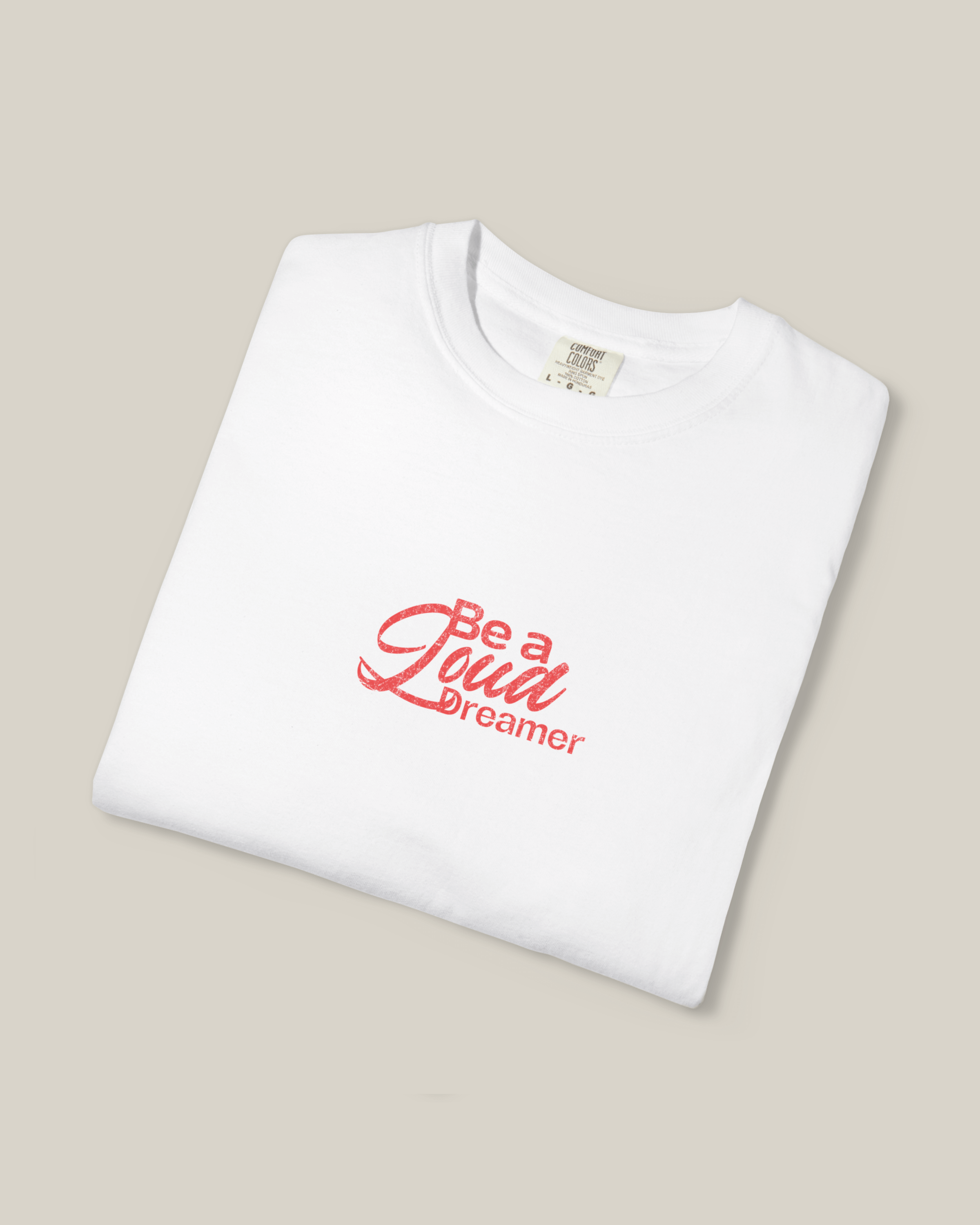 Taily Loud Dreamer Streetwear Graphic T-Shirt in white with bold script lettering design.