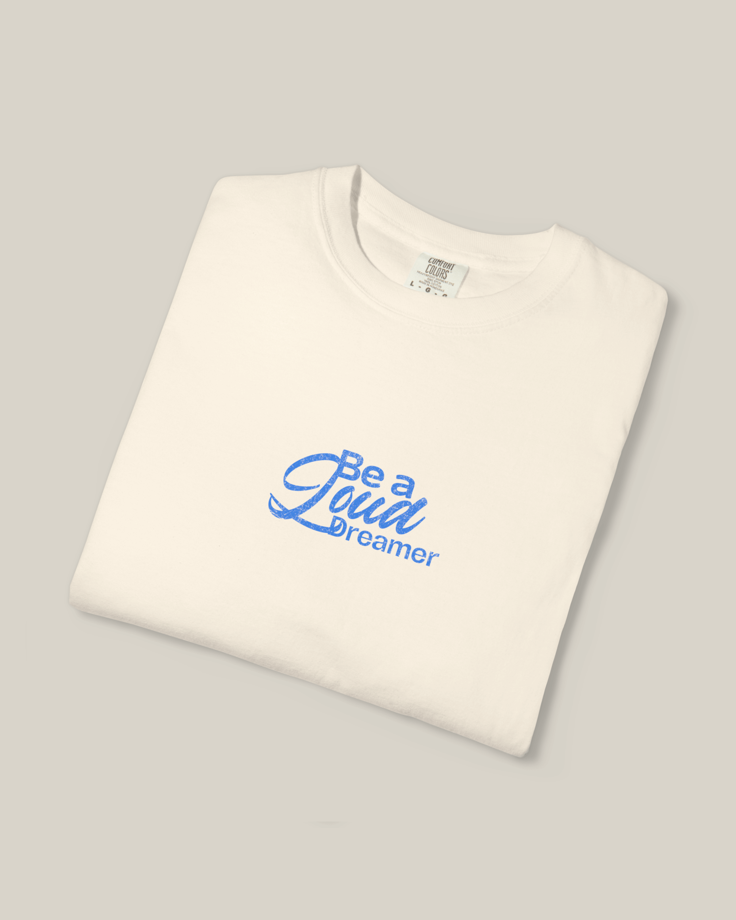 Taily Loud Dreamer Streetwear Graphic T-Shirt in ivory color with bold script logo design.