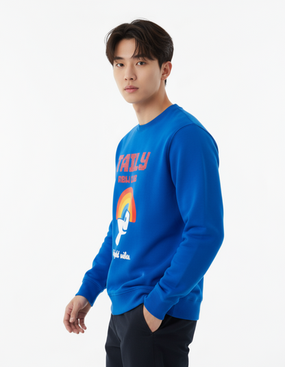 Model wearing Taily RBW Club sweatshirt in Royal Blue with rainbow graphic.