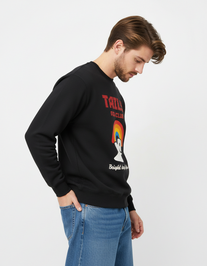 Model wearing Taily RBW Club sweatshirt in black with rainbow graphic and text, showcasing a stylish casual look.
