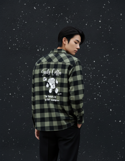 Taily Coffee flannel shirt in Olive worn by a model showcasing the back graphic design.