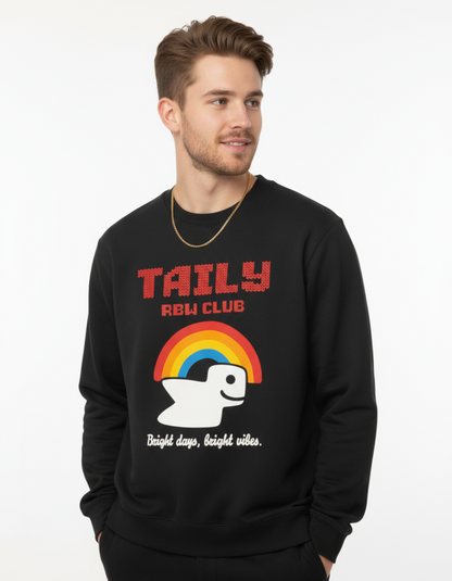 Taily RBW Club sweatshirt in black worn by a model featuring a rainbow graphic and the phrase "Bright days, bright vibes."