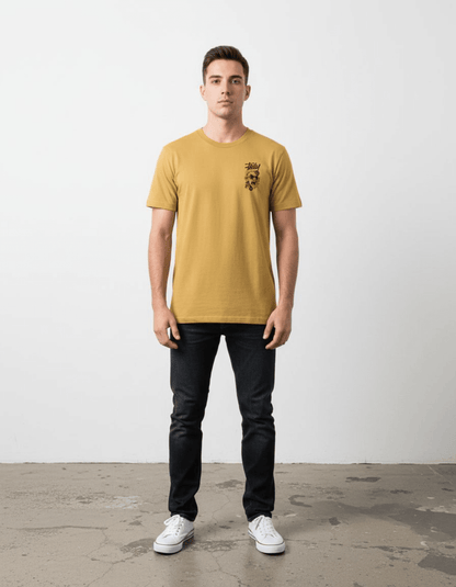 Model wearing Taily Rage Streetwear Tee in mustard colorway, featuring streetwear graphic t-shirt design.