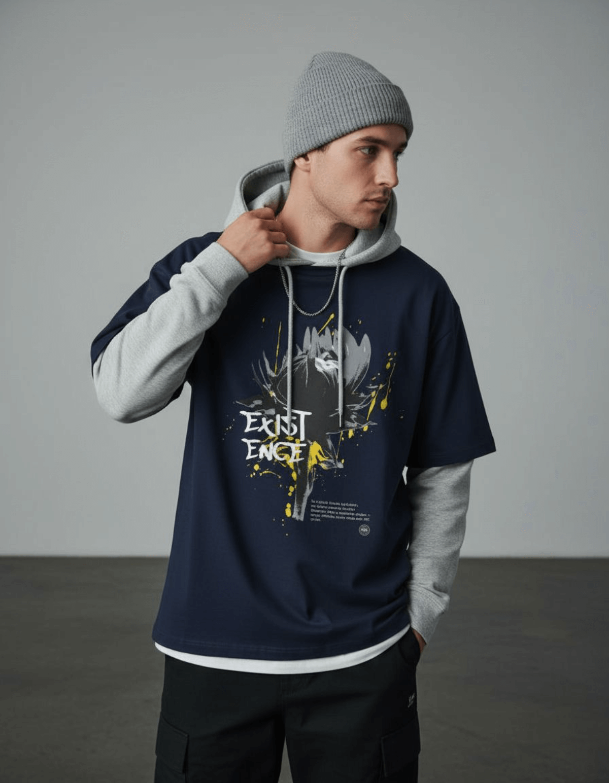 Model wearing Taily Existence Streetwear Oversized T-Shirt in navy with abstract artwork.