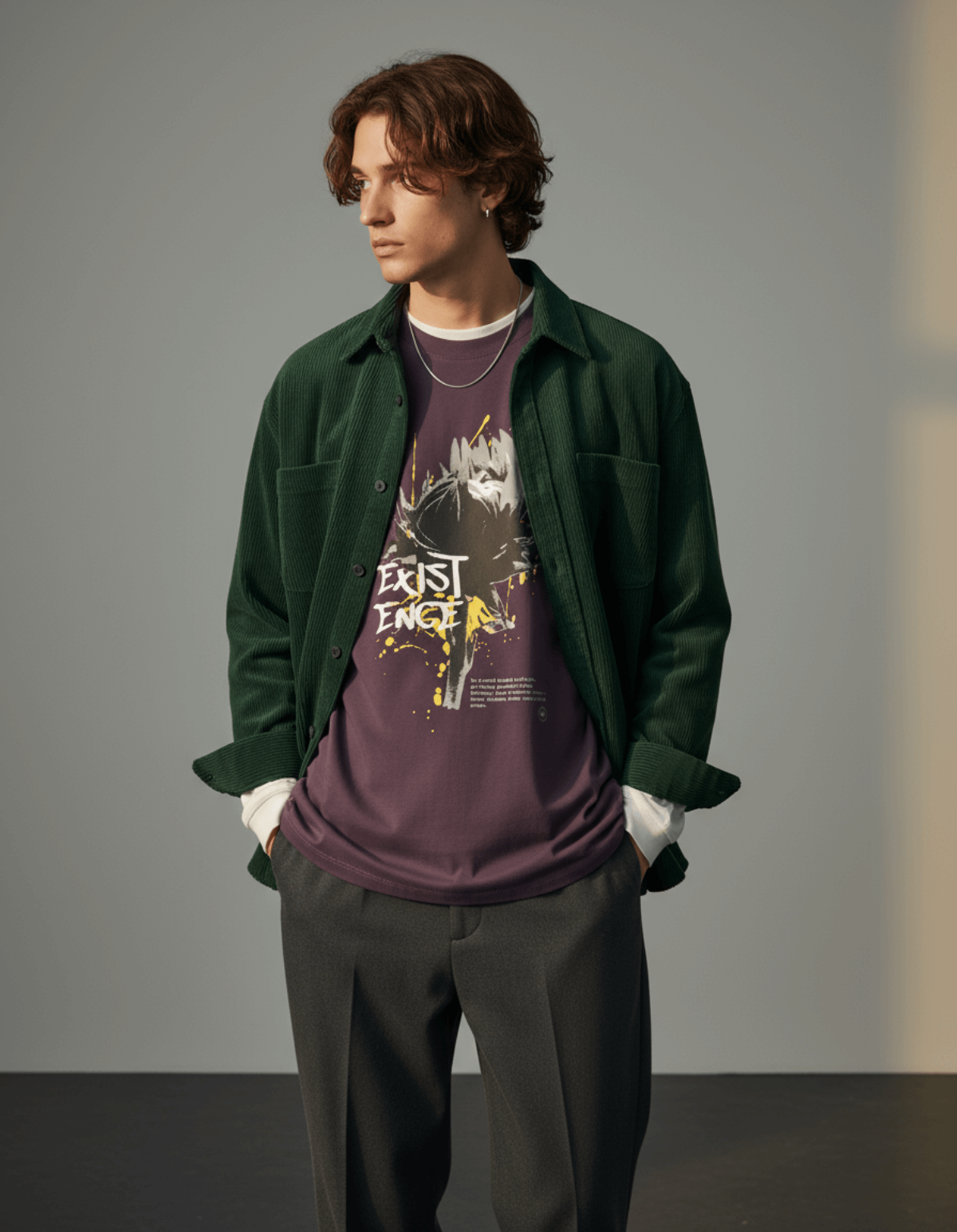 Model wearing Taily “Existence” Streetwear Oversized T-Shirt in plum and green shirt.