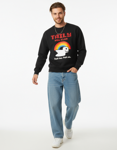 A model wearing the Taily RBW Club sweatshirt in black, featuring a rainbow design and the phrase 'Bright days, bright vibes.'