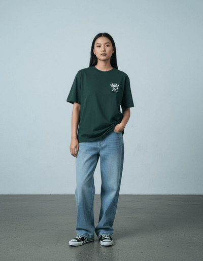 Model wearing Taily Feel It Real boxy tee in forest green, showcasing streetwear boxy t-shirt style with relaxed fit.