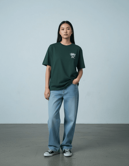 Model wearing Taily Feel It Real boxy tee in forest green, showcasing streetwear boxy t-shirt style with relaxed fit.