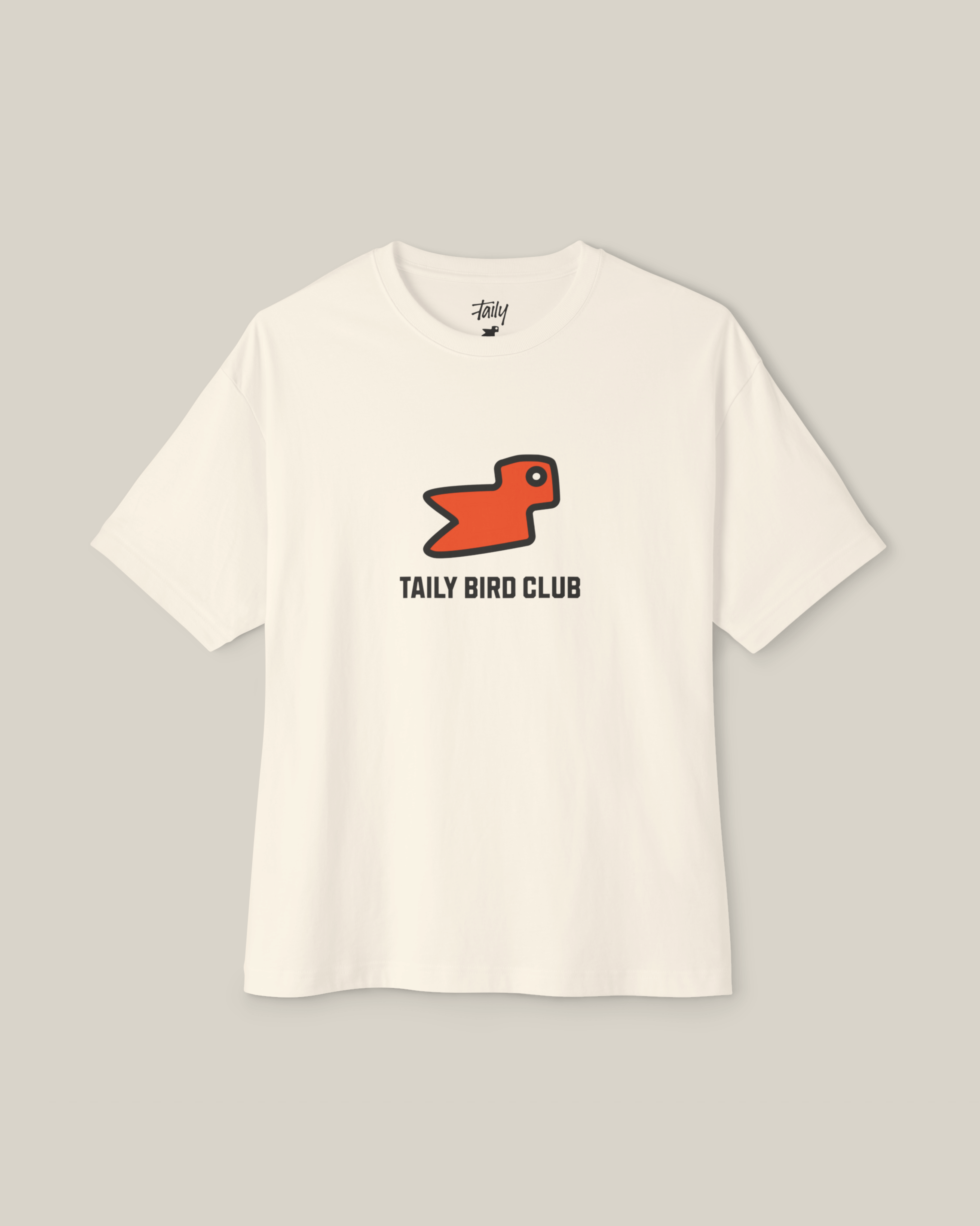 Taily Bird Club Streetwear Boxy T-Shirt in natural color with orange bird design on front.