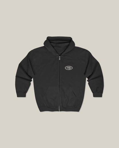 Taily Zip Hoodie in Black featuring an embroidered logo and zip-up design for casual streetwear style.