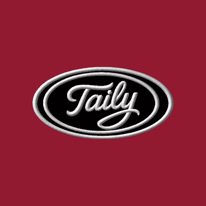Taily Zip Hoodie embroidered logo on cardinal red background, featuring elegant cursive lettering.