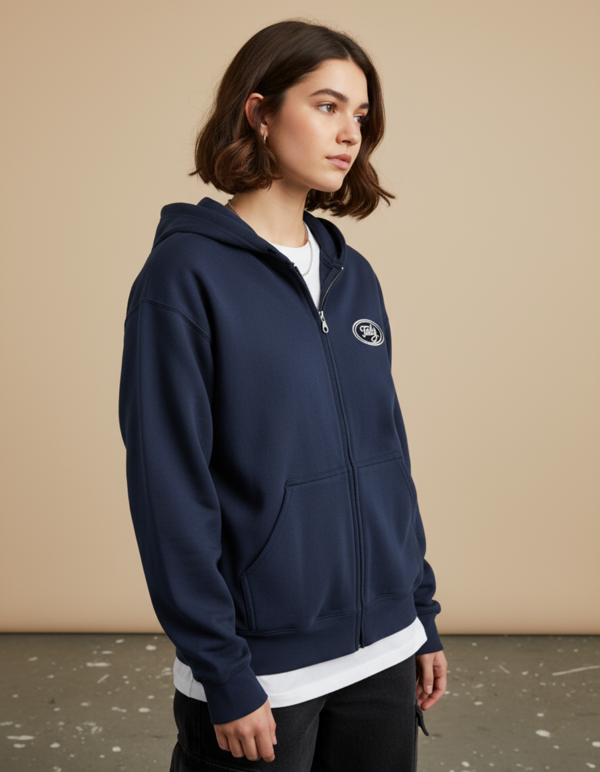 Taily Zip Hoodie – Classic Embroidered Streetwear in Navy worn by a model, showcasing a relaxed fit and logo detail.