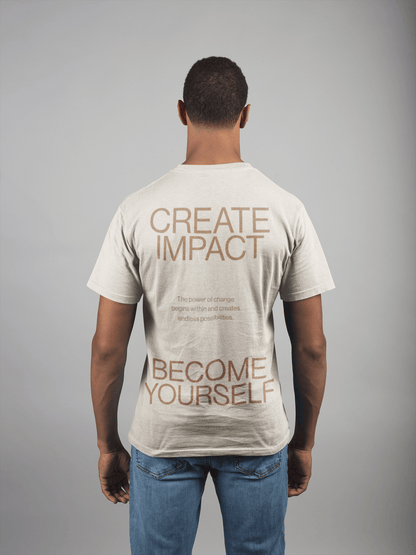 Back view of a man wearing the Create Impact oversized tee with motivational text for personal growth.