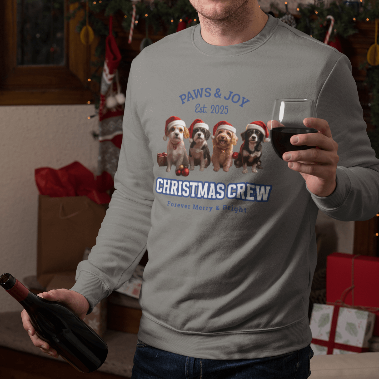 Man in a beanie wearing a gray Christmas sweatshirt with 