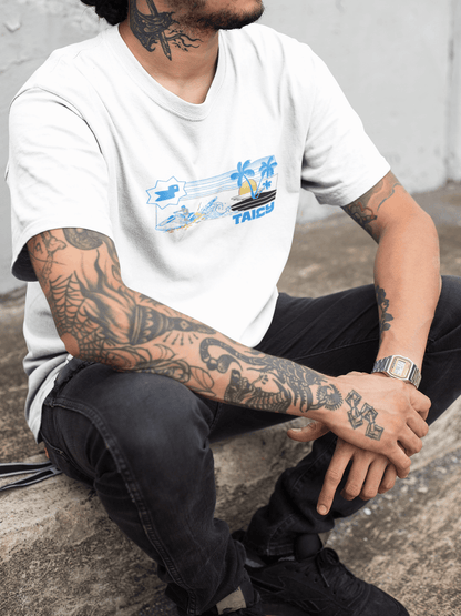 Model wearing Taily Jet Splash white graphic t-shirt featuring jet ski and island print, showcasing streetwear style.