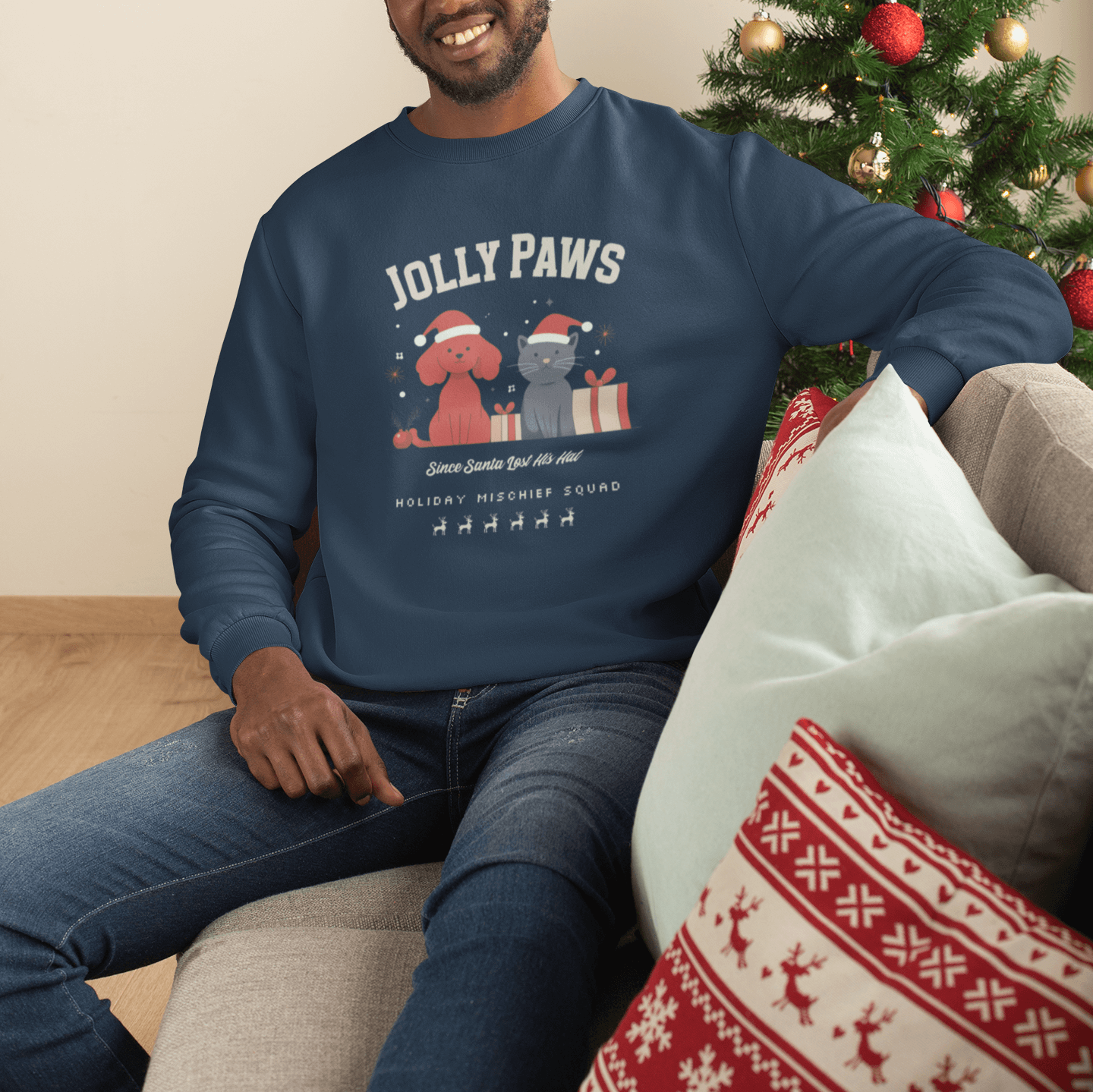 Man wearing a relaxed fit sweatshirt with a dog and cat Christmas design, perfect for pet lovers celebrating the festive season.